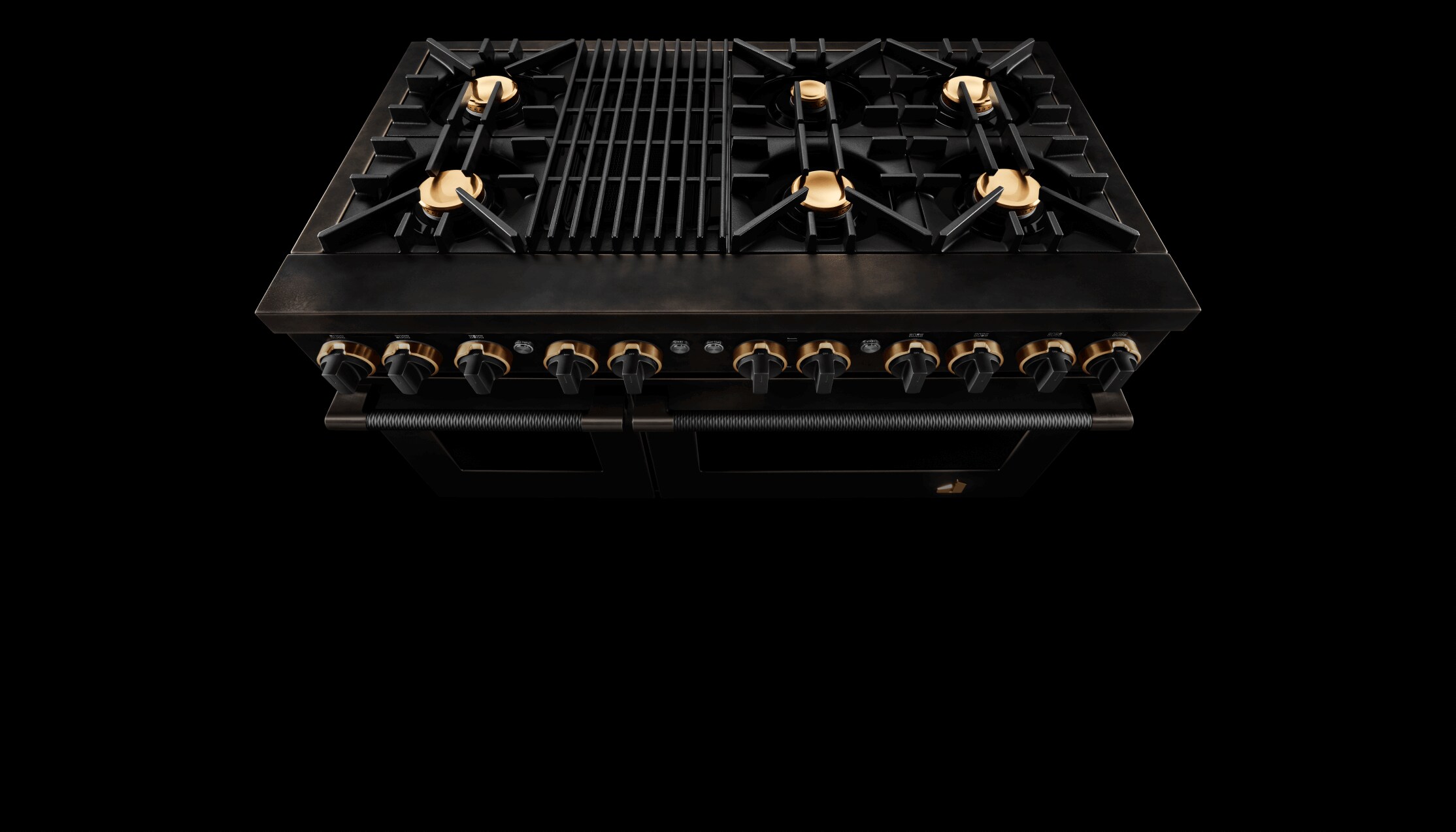 The brass "Defiant J" badge on the Smoke & Brass range.